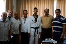 اللجنة الشعبية لخدمات مخيم العين تكرم لاعب التايكواندو احمد بركات